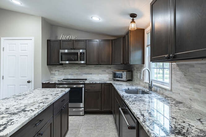 1680 Battes Road Green Bay, VA 23942 - Photo 8 of 38 a kitchen with stainless steel appliances granite countertop a sink stove and cabinets