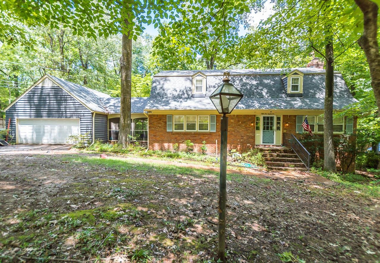 5986 Ivanhoe Road Bartlett, TN 38134 - Photo 1 of 25 a view of a house with backyard and a tree