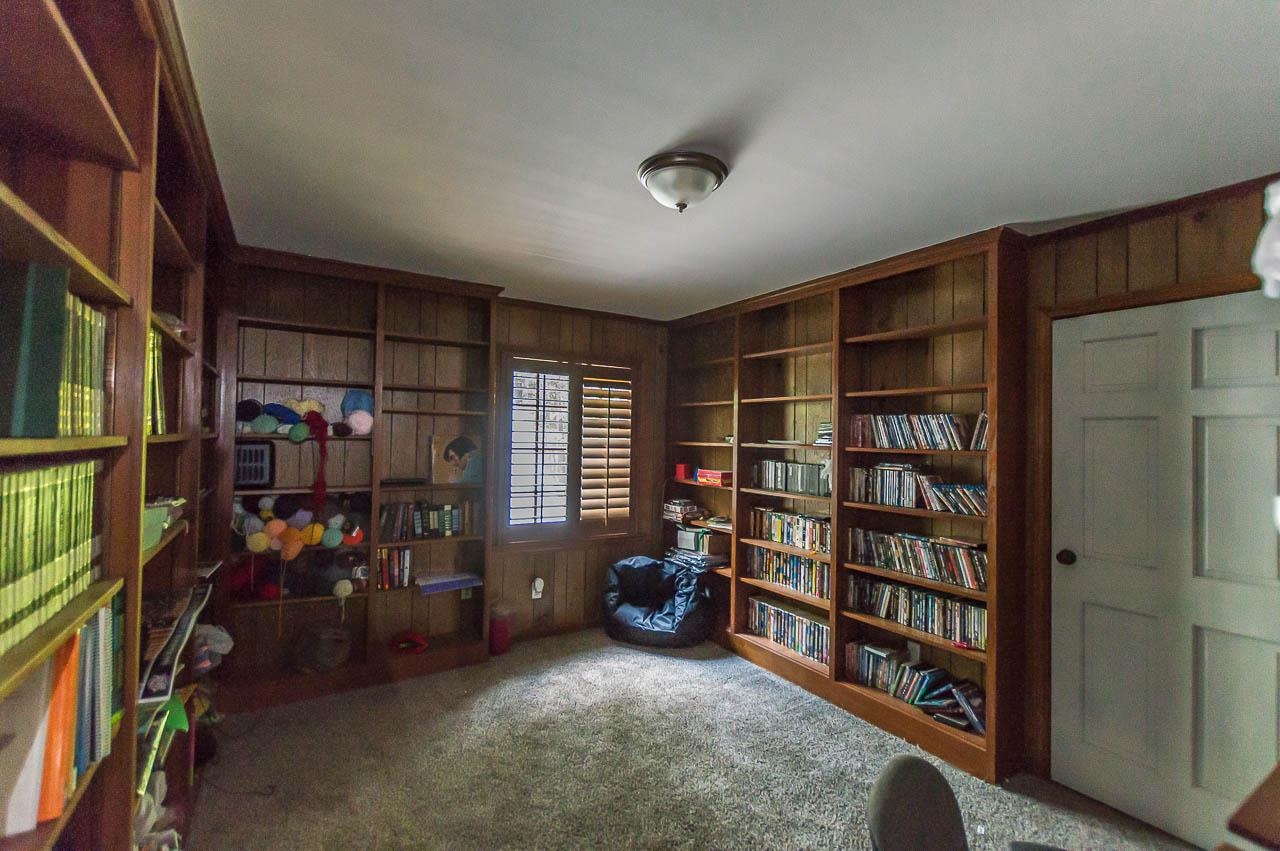 5986 Ivanhoe Road Bartlett, TN 38134 - Photo 19 of 25 a view of walk in closet with clothes and shoes