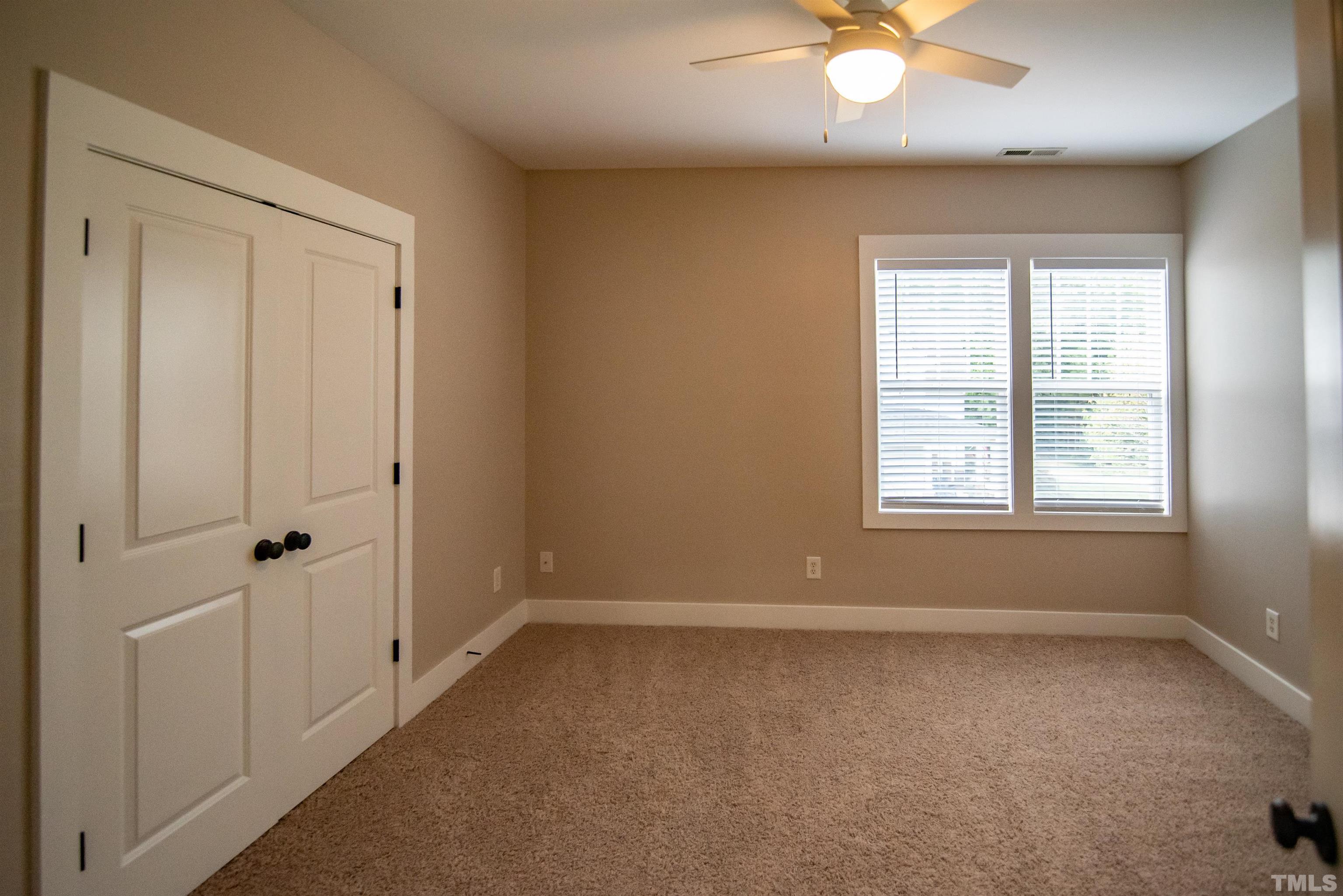 15004 Massimo Dr. Wake Forest, NC 27587 - Photo 20 of 27 a view of an empty room with a window