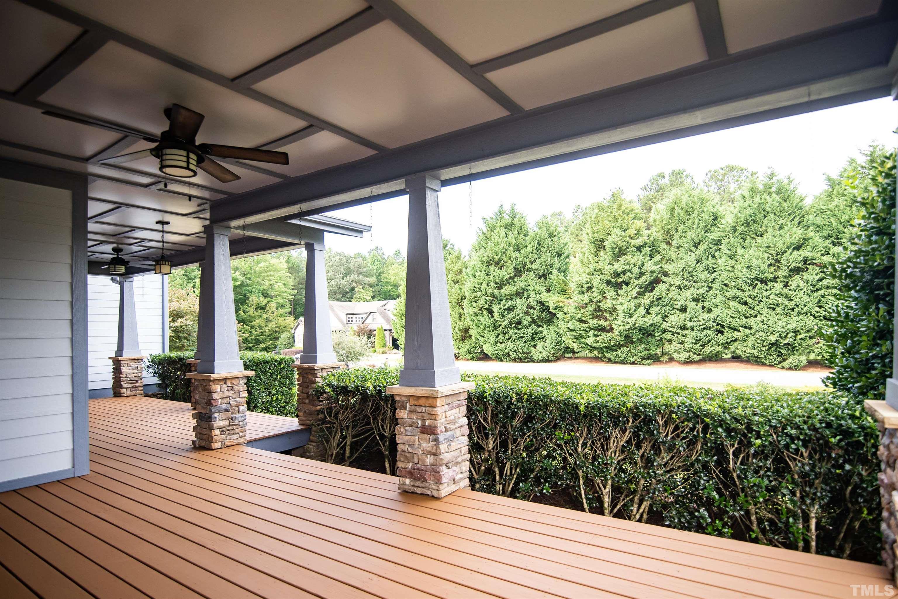 15004 Massimo Dr. Wake Forest, NC 27587 - Photo 3 of 27 a view of a porch and garden