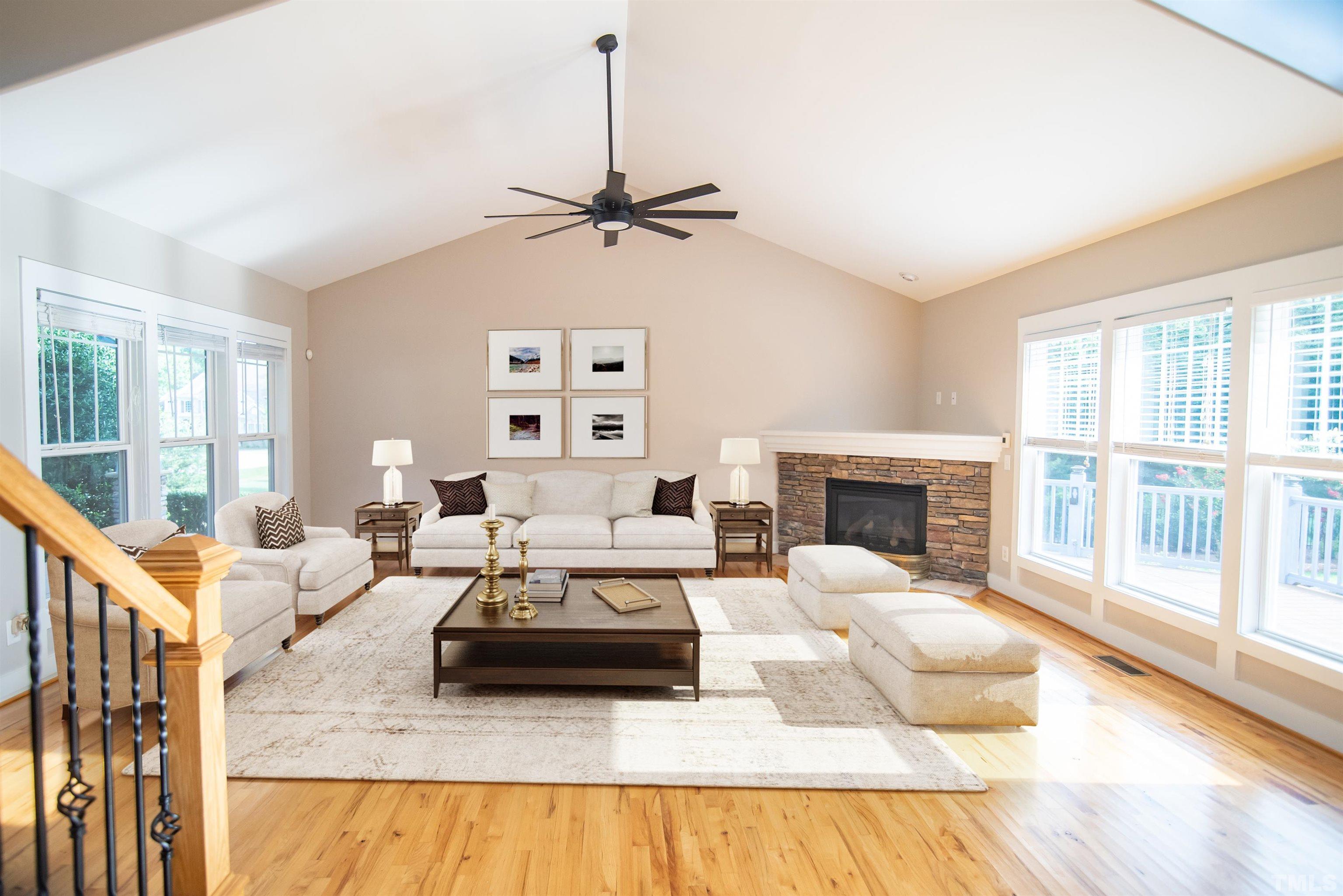 15004 Massimo Dr. Wake Forest, NC 27587 - Photo 7 of 27 a living room with furniture fireplace and a flat screen tv