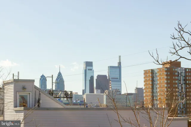 a view of city with tall buildings