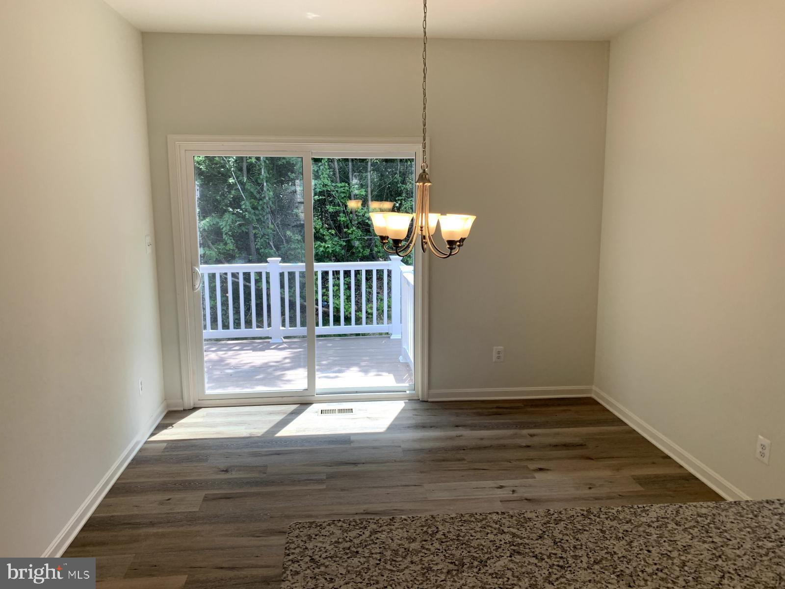 263 Trails Way Joppa, MD 21085 - Photo 4 of 27 a view of entryway with wooden floor