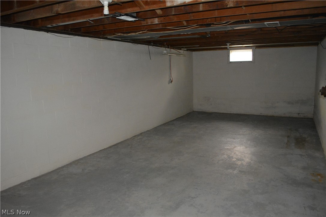 5674 Myers Road New Franklin, OH 44319 - Photo 22 of 26 Large room in the basement perfect for finishing!