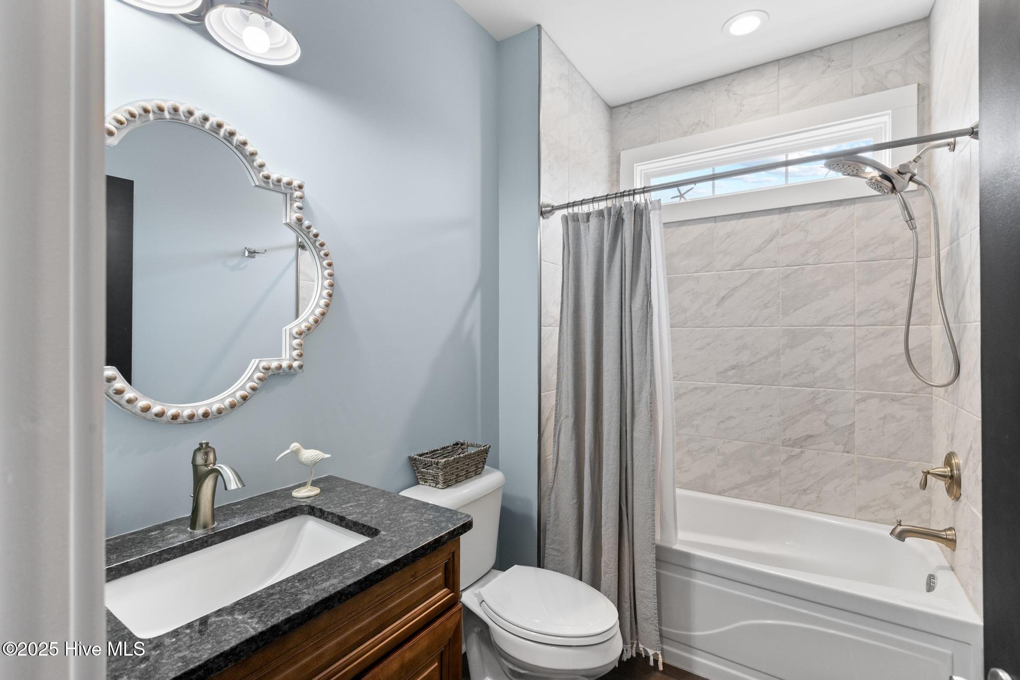 817 Sweetgrass Street Holly Ridge, NC 28445 - Photo 22 of 72 DOWNSTAIRS BATH.