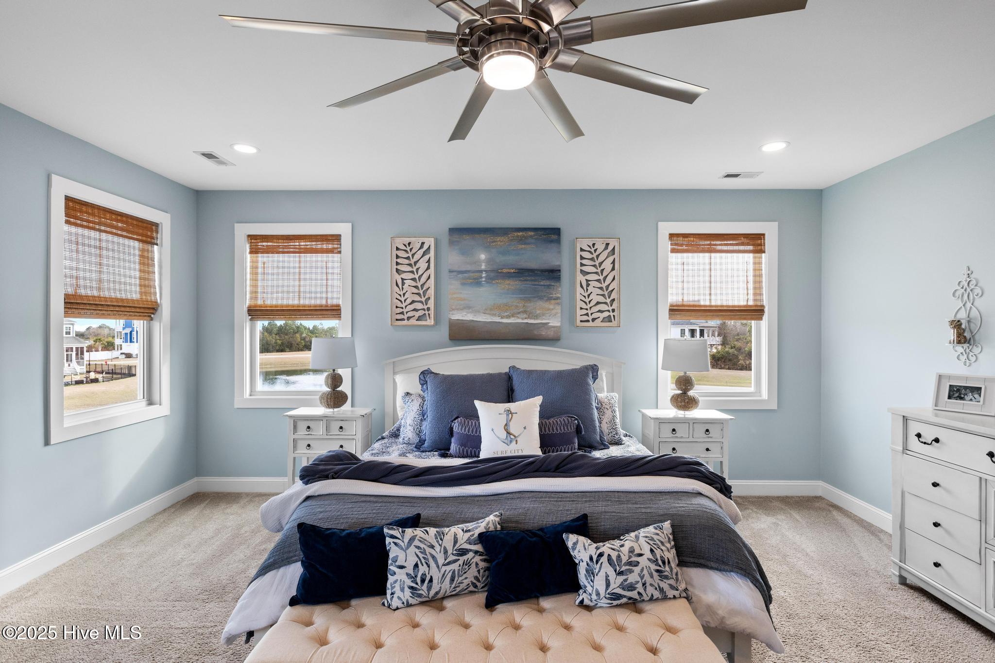 817 Sweetgrass Street Holly Ridge, NC 28445 - Photo 32 of 72 SPACIOUS PRIMARY BEDROOM SUITE.