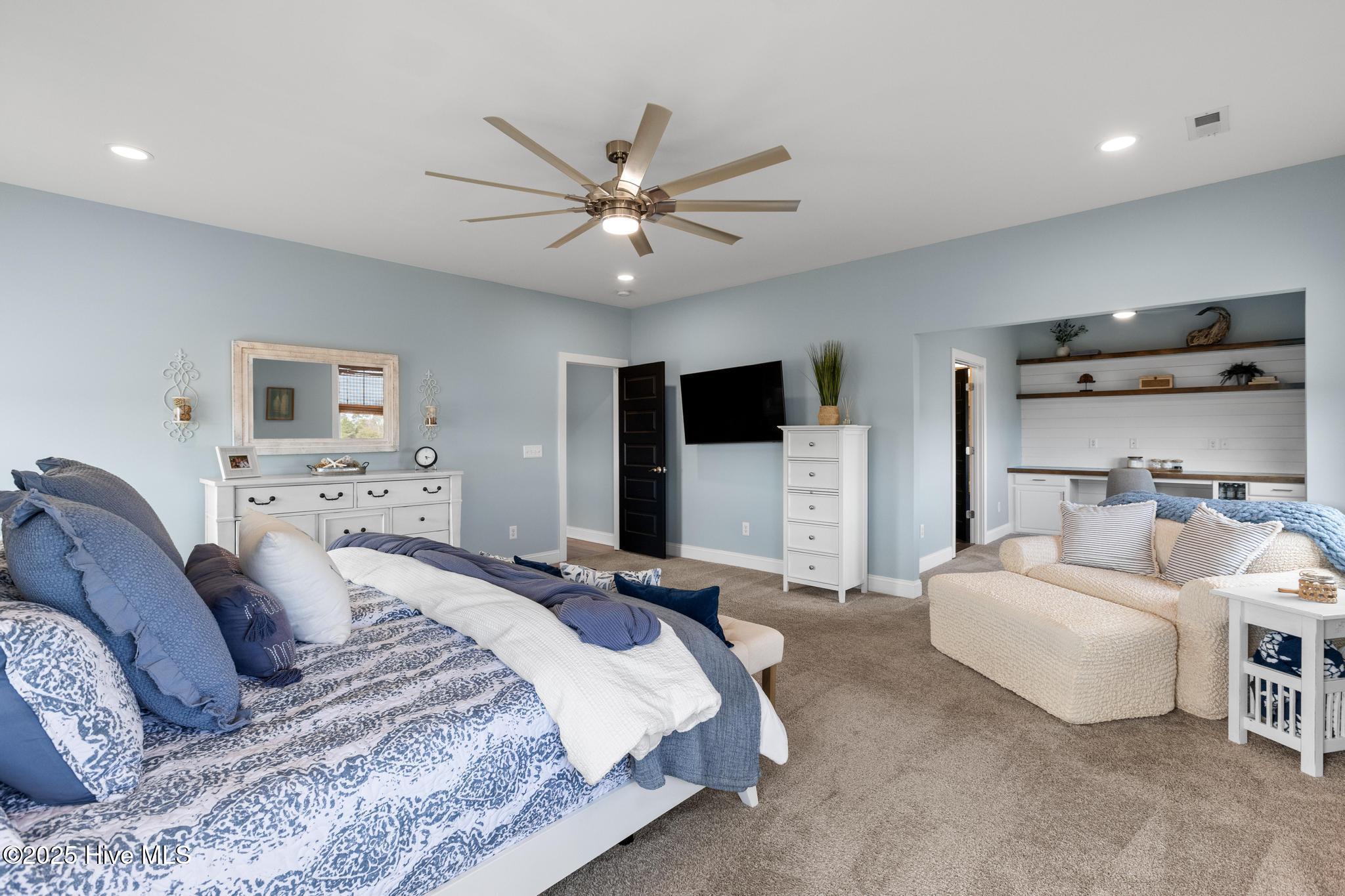 817 Sweetgrass Street Holly Ridge, NC 28445 - Photo 33 of 72 PRIMARY SUITE WITH SITTING ROOM.