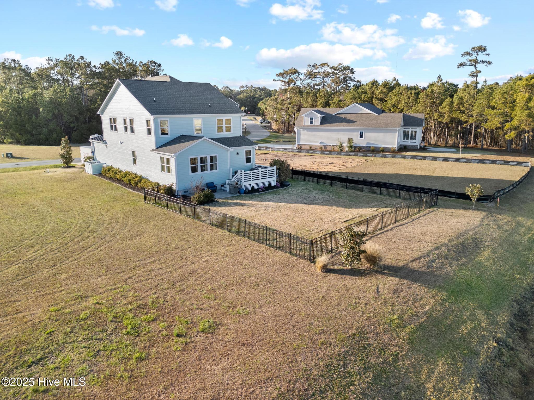 817 Sweetgrass Street Holly Ridge, NC 28445 - Photo 53 of 72 metal fencing installed and approved by ARC