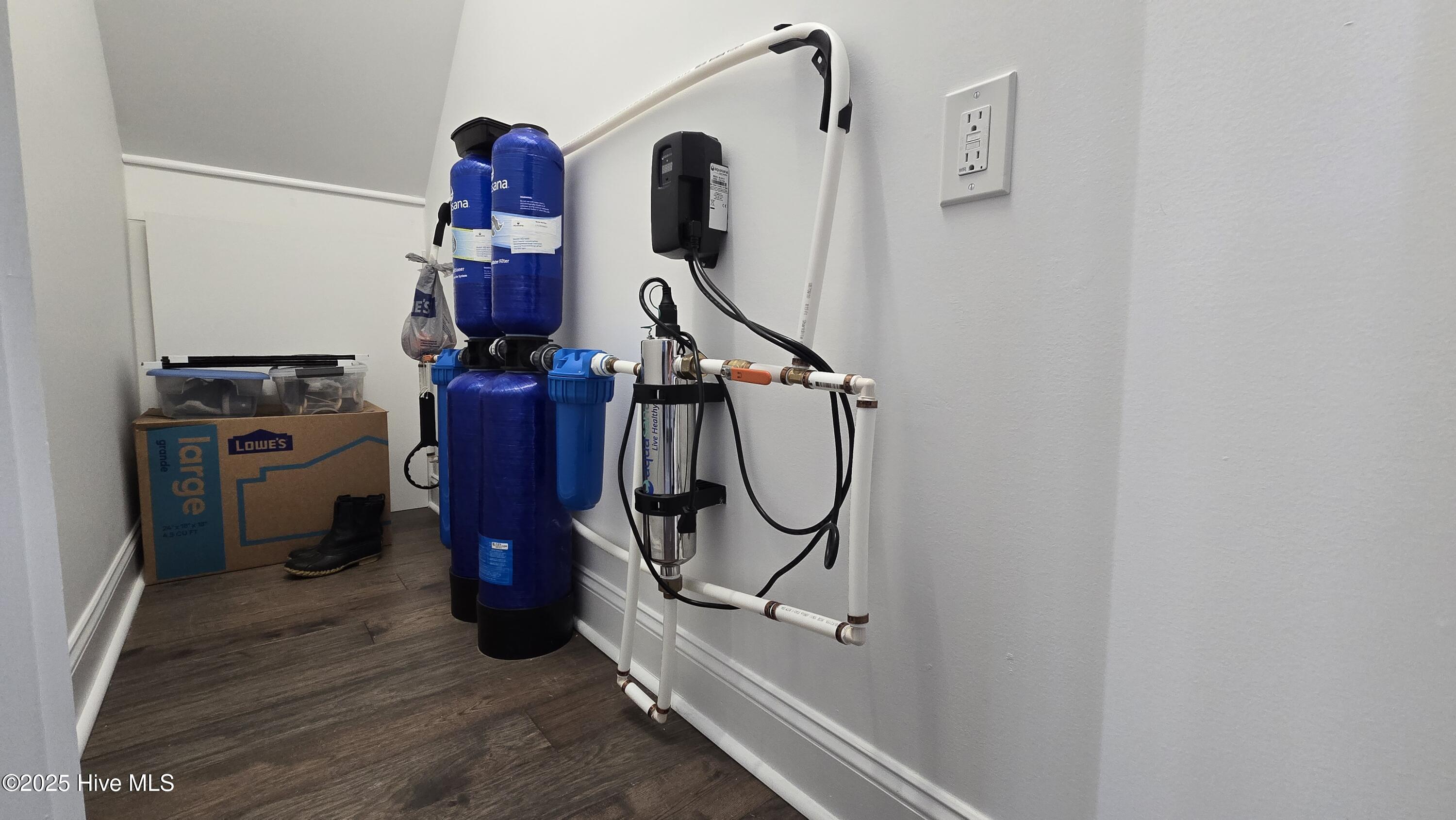 817 Sweetgrass Street Holly Ridge, NC 28445 - Photo 54 of 72 water filtration system in hall closet downstairs