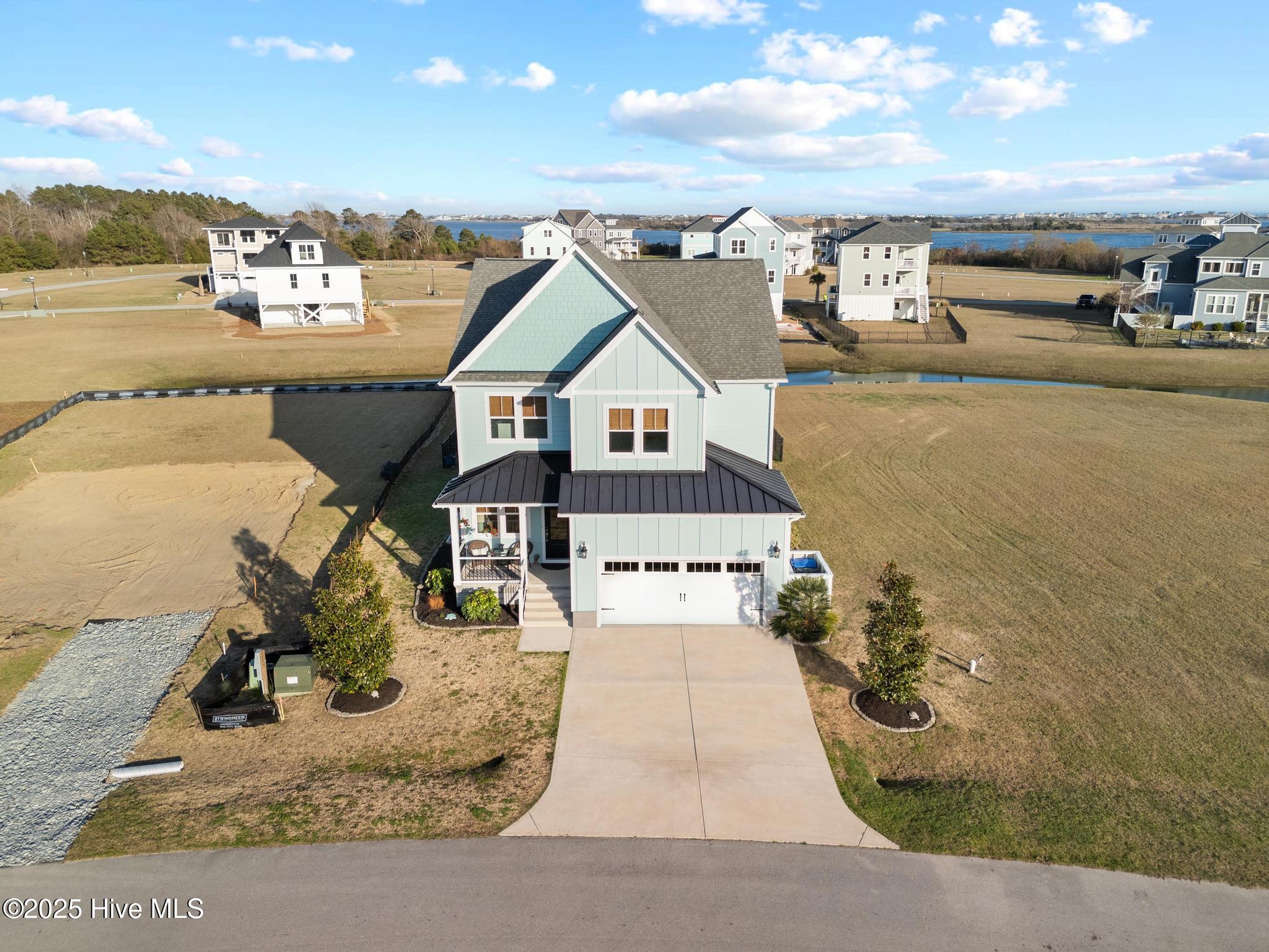 817 Sweetgrass Street Holly Ridge, NC 28445 - Photo 59 of 72 DJI_20250315180230_0353_D
