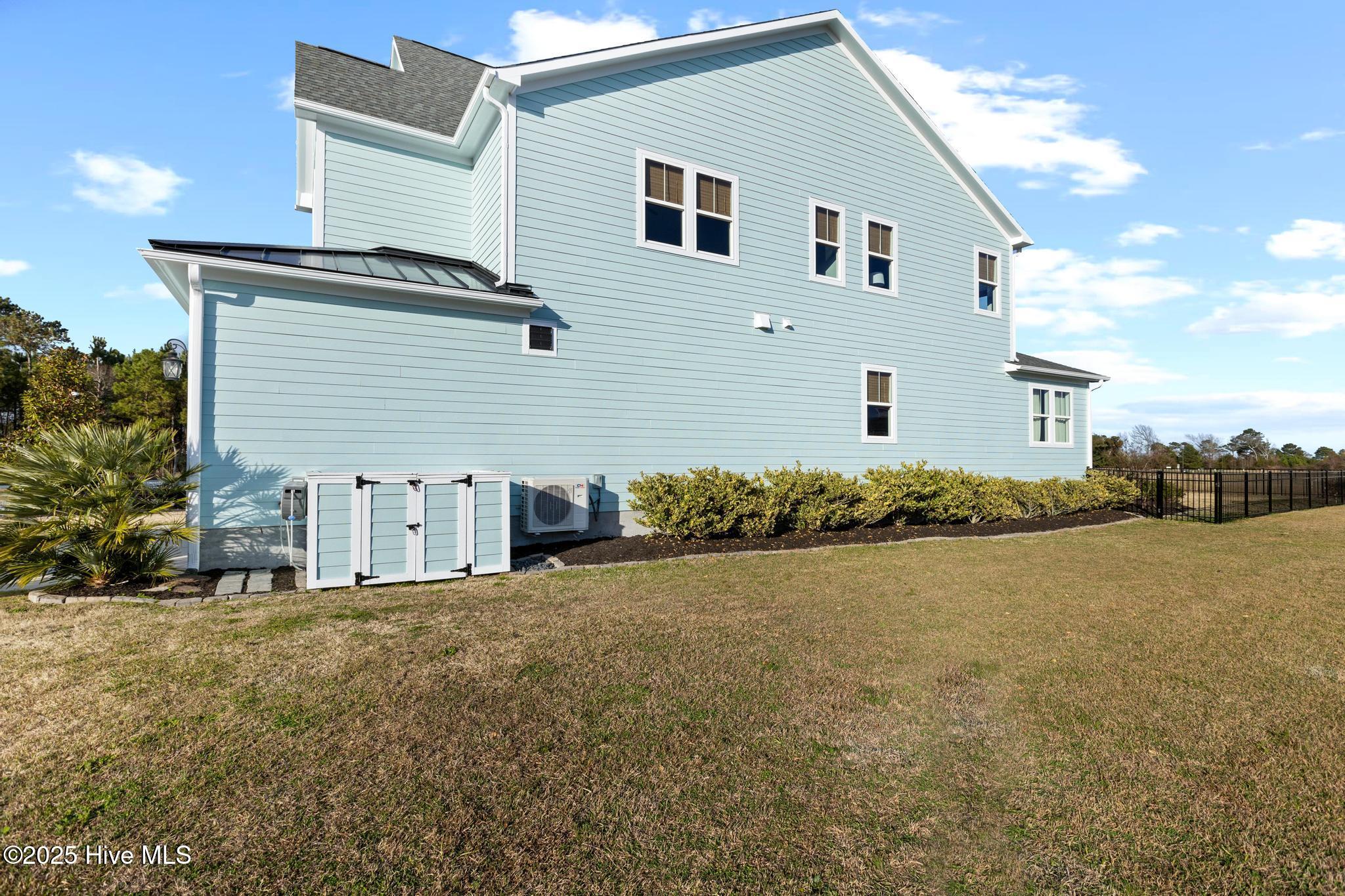 817 Sweetgrass Street Holly Ridge, NC 28445 - Photo 6 of 72 INCLUDED! >> MINI SPLIT ON EXTERIOR GARAGE WALL, GARAGE IS INSULATED AND CONDITIONED.