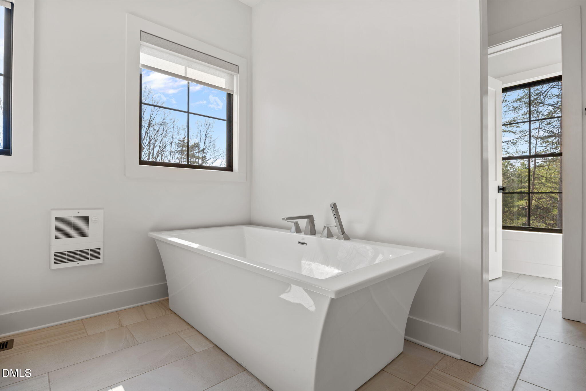 6450 Moores Mill Road Rougemont, NC 27572 - Photo 25 of 66 a white bath tub sitting in a bathroom