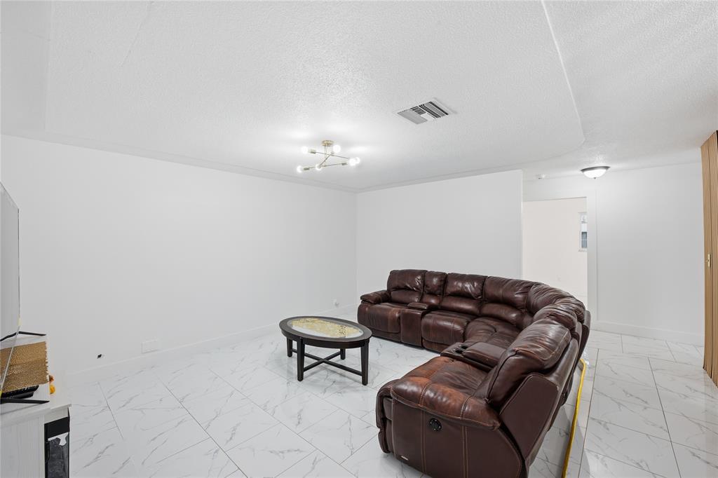 6599 Northwest 1st Street Margate, FL 33063 - Photo 25 of 43 a living room with furniture