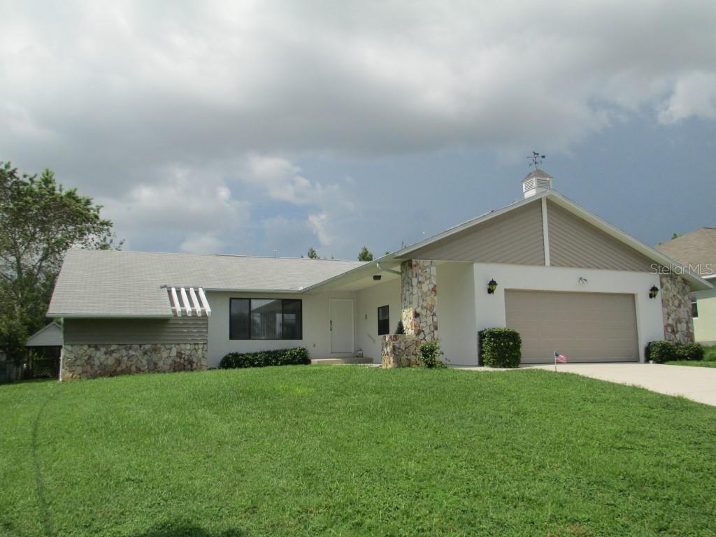 9125 Swiss Road Spring Hill, FL 34606 - Photo 1 of 1 9125 Swiss Rd. 3/2/2 with almost 1700 SF basement