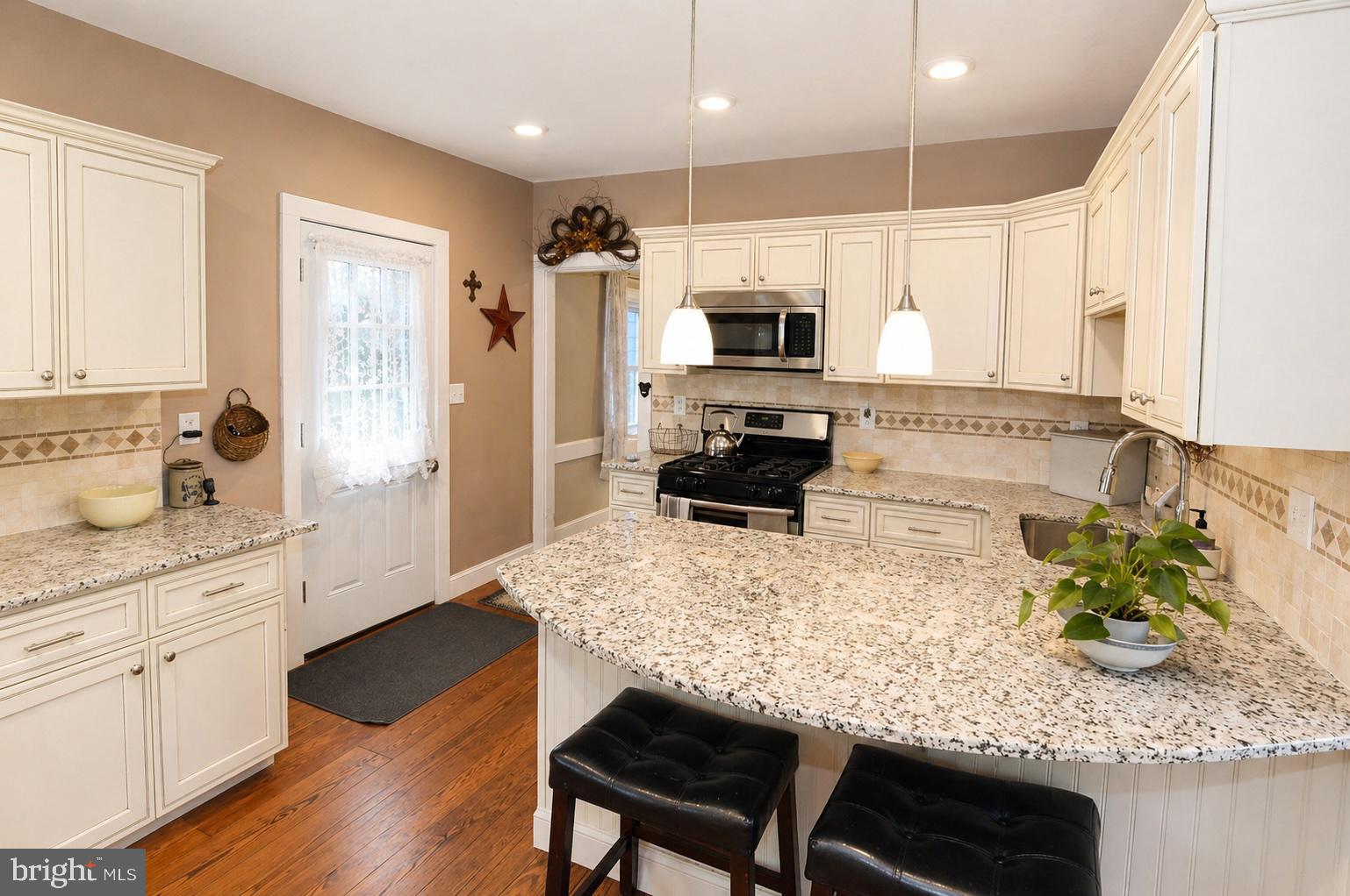 129 Buttonwood Street Mount Holly, NJ 08060 - Photo 11 of 31 Kitchen / Breakfast Bar