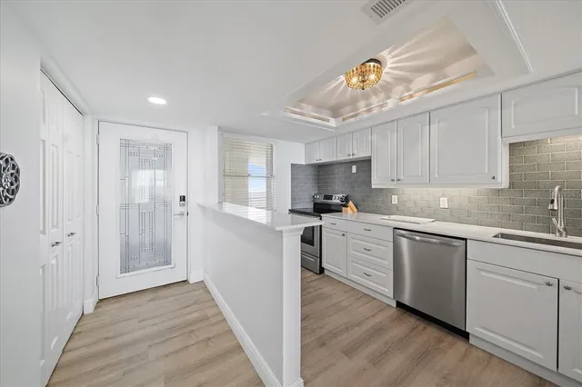 $595,000 | 1770 Benjamin Franklin Drive, Unit 704, Sarasota, FL 34236