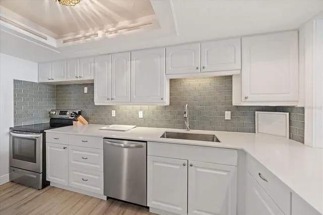 $595,000 | 1770 Benjamin Franklin Drive, Unit 704, Sarasota, FL 34236