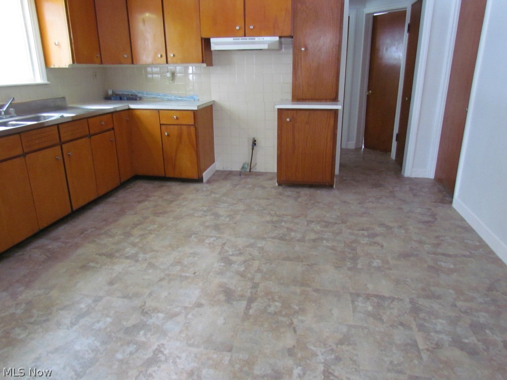 16339 Snow Road Burton, OH 44021 - Photo 2 of 16 New kitchen floor January 2015!