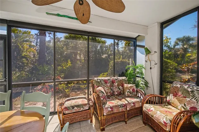 a view of a house with a small yard and plants