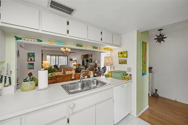 a utility room with storage and utility