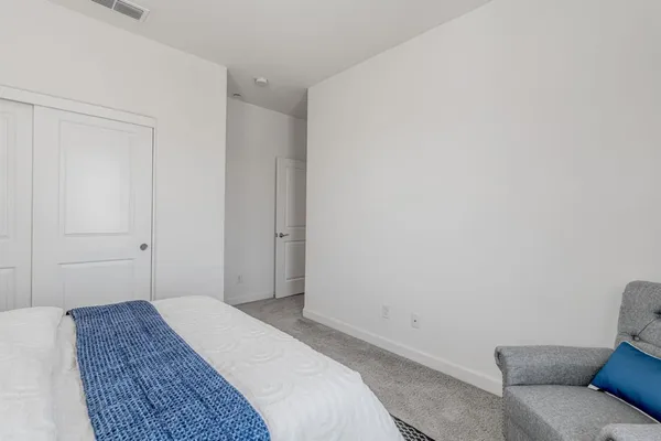 a view of an empty walk in closet