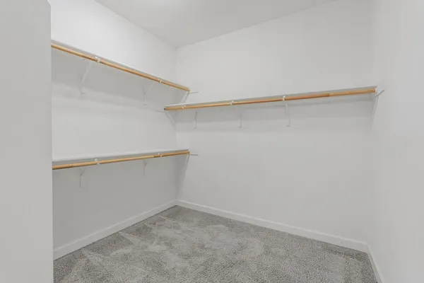 a view of a room with racks on the wall