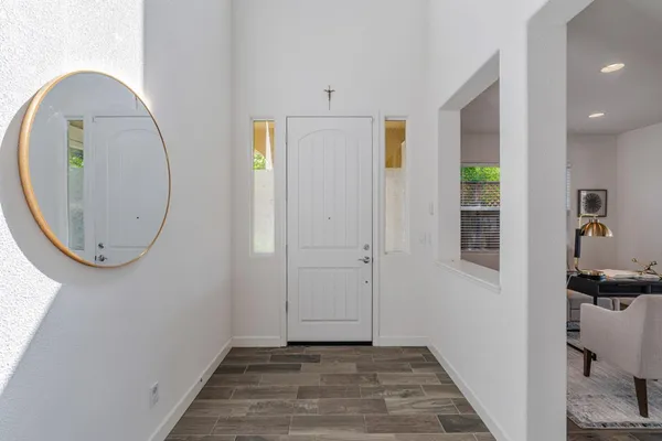 a view of kitchen with furniture and wooden floor