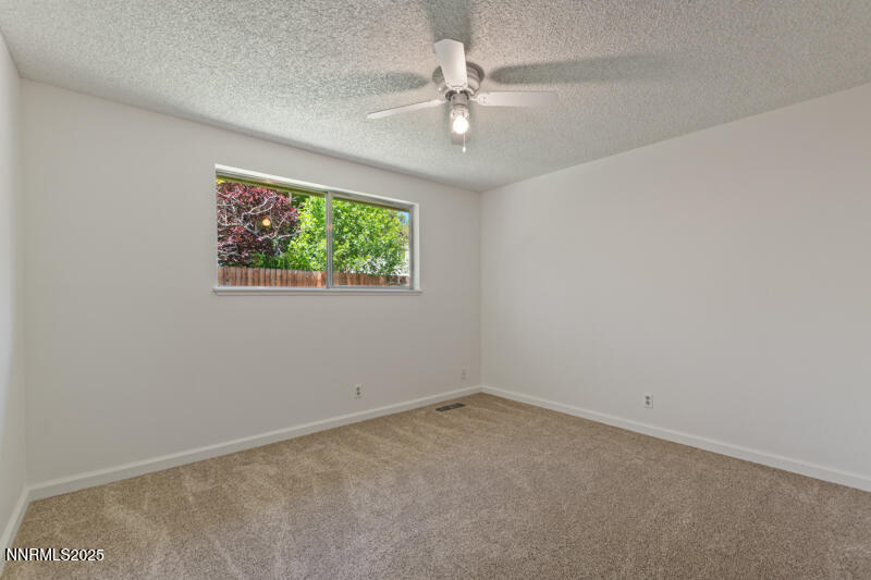 2995 Santa Ana Drive Reno, NV 89502 - Photo 13 of 19 an empty room with a window