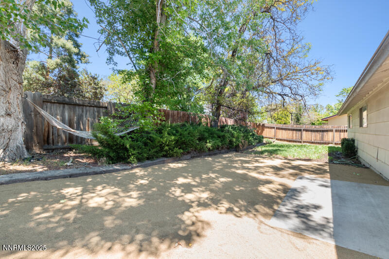 2995 Santa Ana Drive Reno, NV 89502 - Photo 16 of 19 a view of a yard with plants and trees