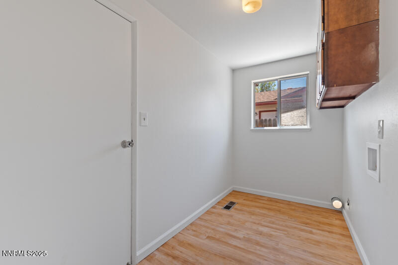 2995 Santa Ana Drive Reno, NV 89502 - Photo 6 of 19 a view of empty room with wooden floor