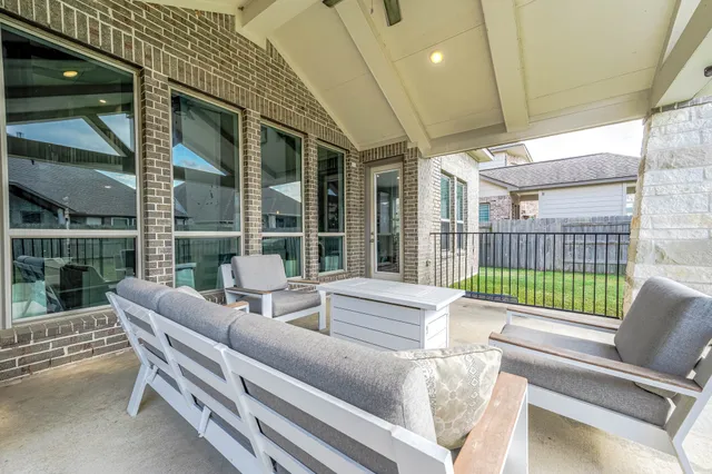 a balcony with furniture
