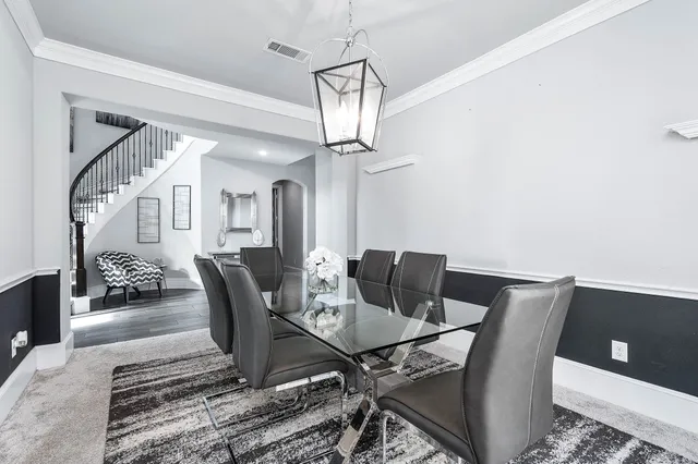 a view of a dining room with furniture