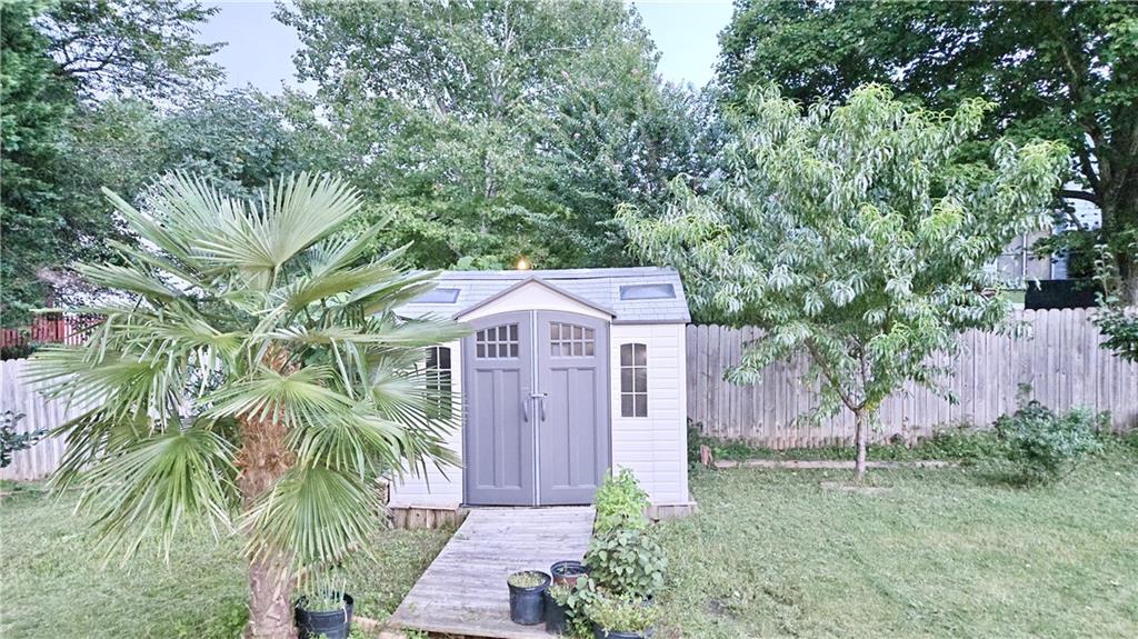 2233 Hansford Pass Buford, GA 30519 - Photo 13 of 45 a view of a back yard of the house