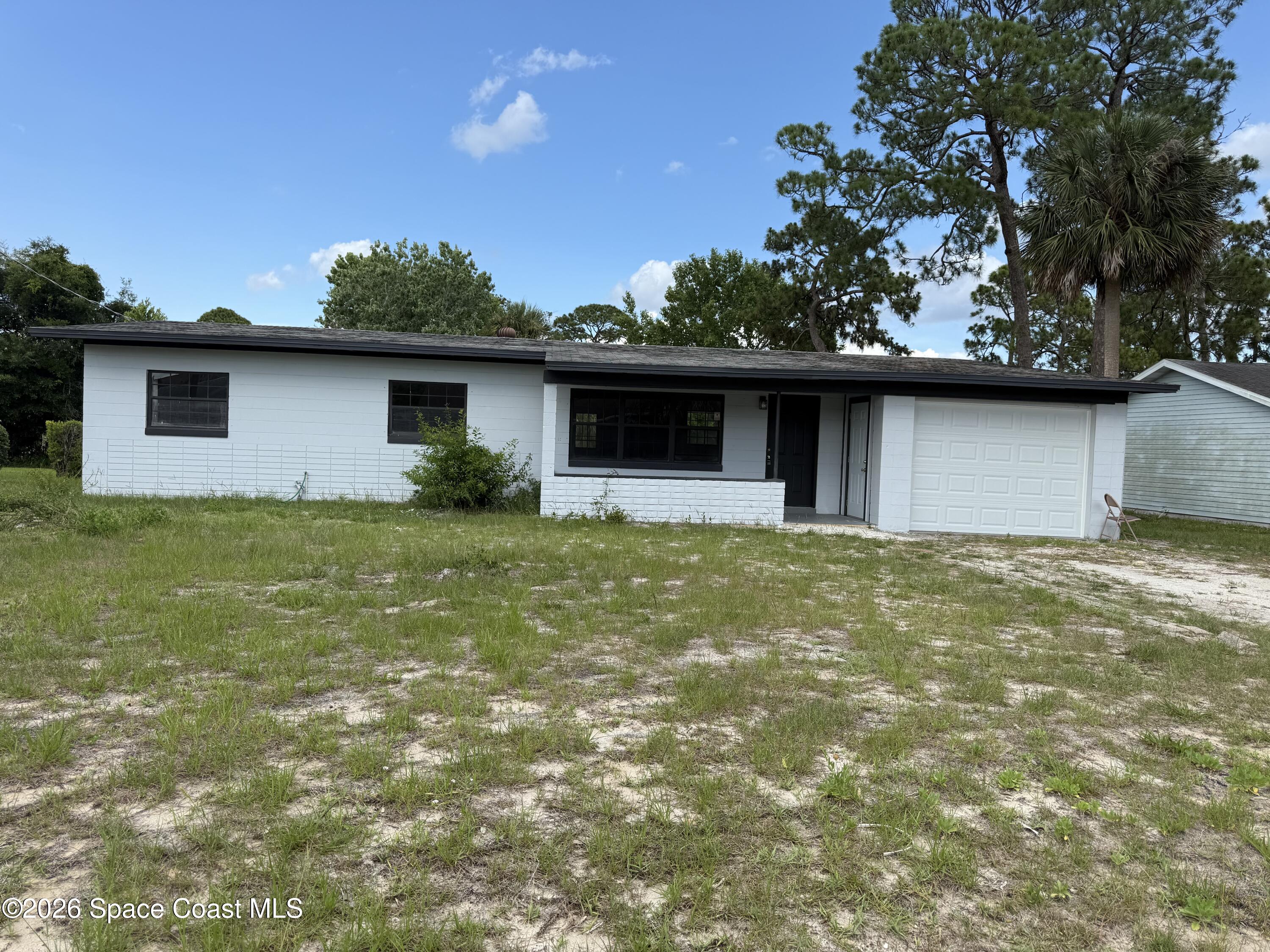 4785 Tuscarora Road Titusville, FL 32780 - Photo 1 of 10 IMG_8408