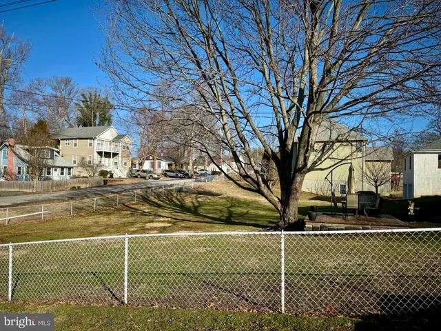 a view of balcony with seating space and hardwood floor