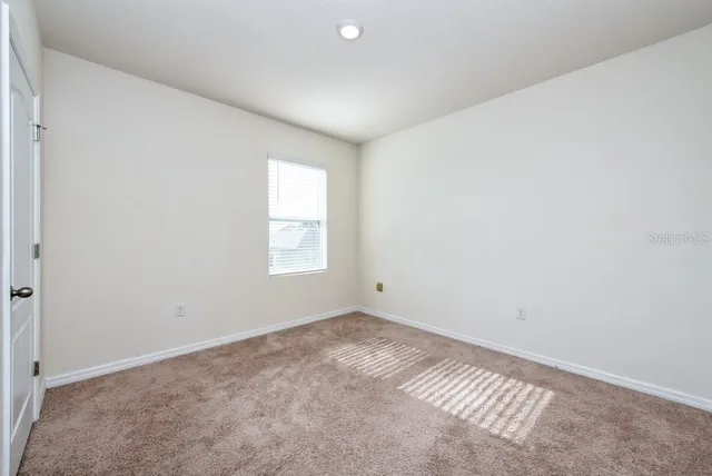 an empty room with closet