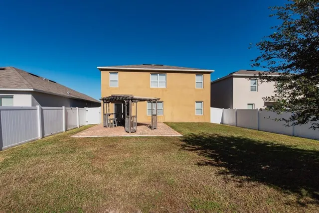 a house view with a outdoor space