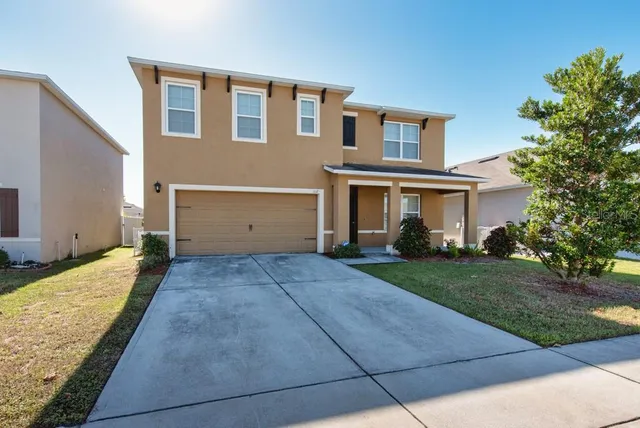 a front view of house with yard
