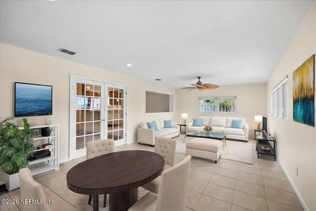 a living room with furniture and a table