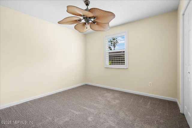 a view of a small space with a fan