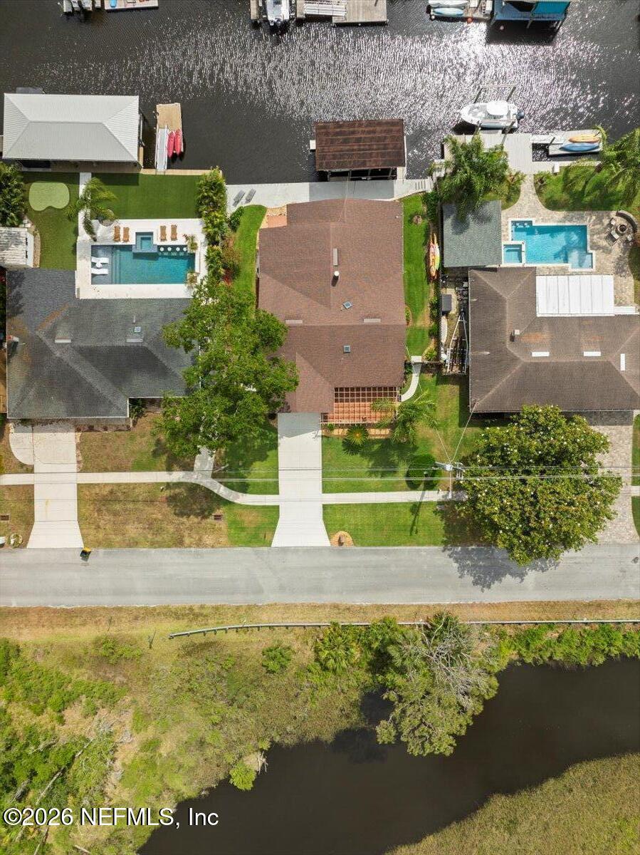 4201 San Pablo Road South Jacksonville, FL 32250 - Photo 2 of 50 an aerial view of a house with a yard