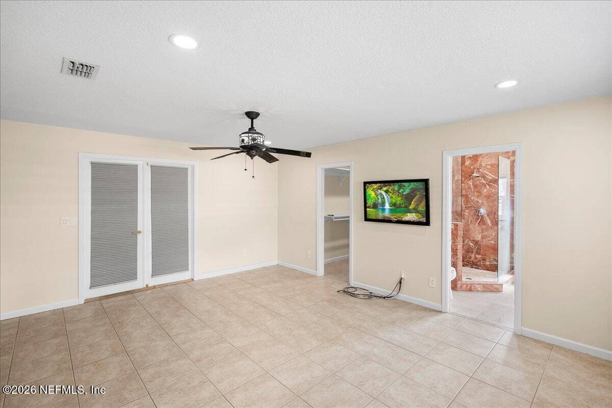 4201 San Pablo Road South Jacksonville, FL 32250 - Photo 24 of 50 a view of a big room with closet and windows
