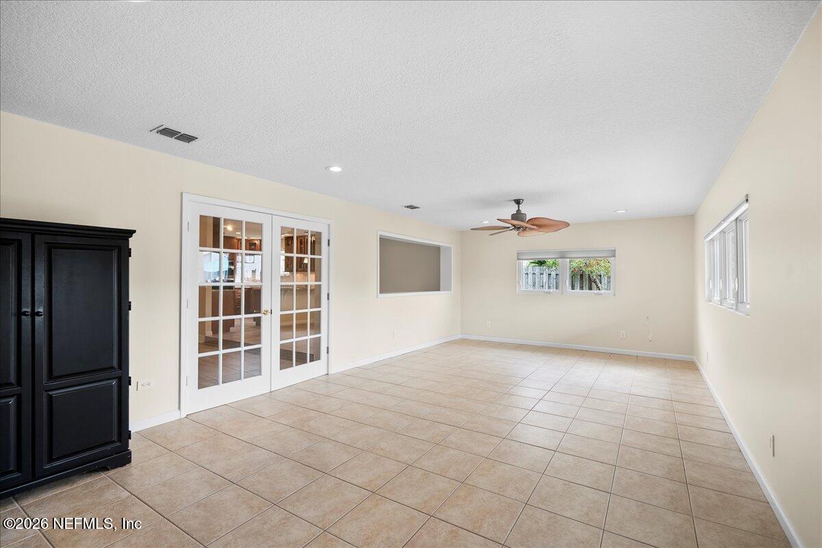 4201 San Pablo Road South Jacksonville, FL 32250 - Photo 29 of 50 an empty room with windows
