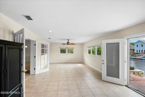 a view of livingroom with hardwood floor and a ceiling fan