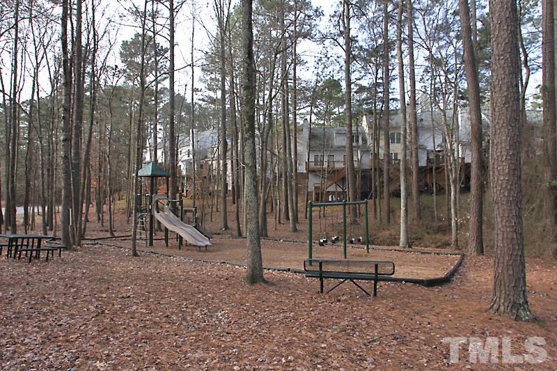4901 Kinross Court Raleigh, NC 27613 - Photo 17 of 18 a view of a park with a slide
