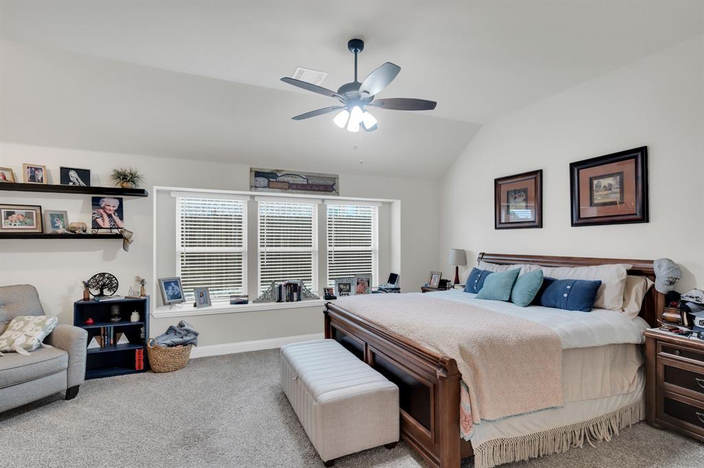 5038 Ridgehurst Lane Midlothian, TX 76065 - Photo 16 of 37 a bedroom with a bed and a large window