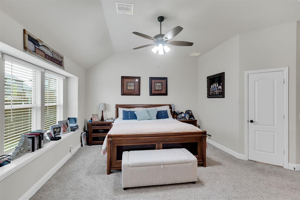 5038 Ridgehurst Lane Midlothian, TX 76065 - Photo 17 of 37 a bedroom with a bed and window