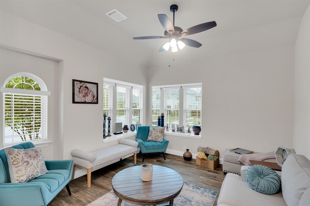5038 Ridgehurst Lane Midlothian, TX 76065 - Photo 3 of 37 a living room with furniture and a large window