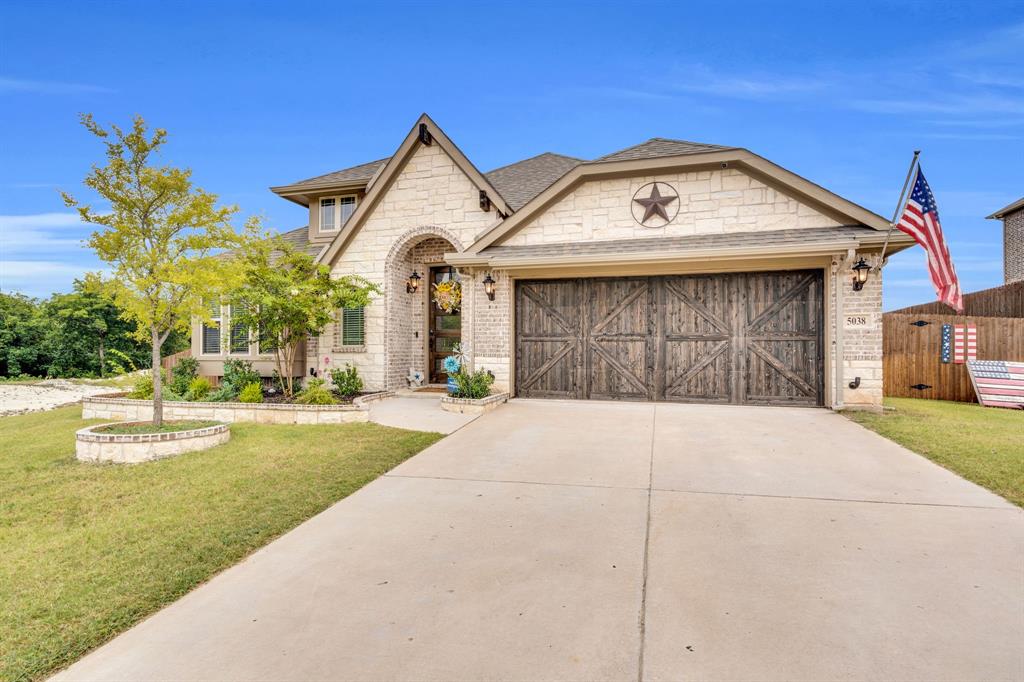 5038 Ridgehurst Lane Midlothian, TX 76065 - Photo 34 of 37 a front view of a house with a yard